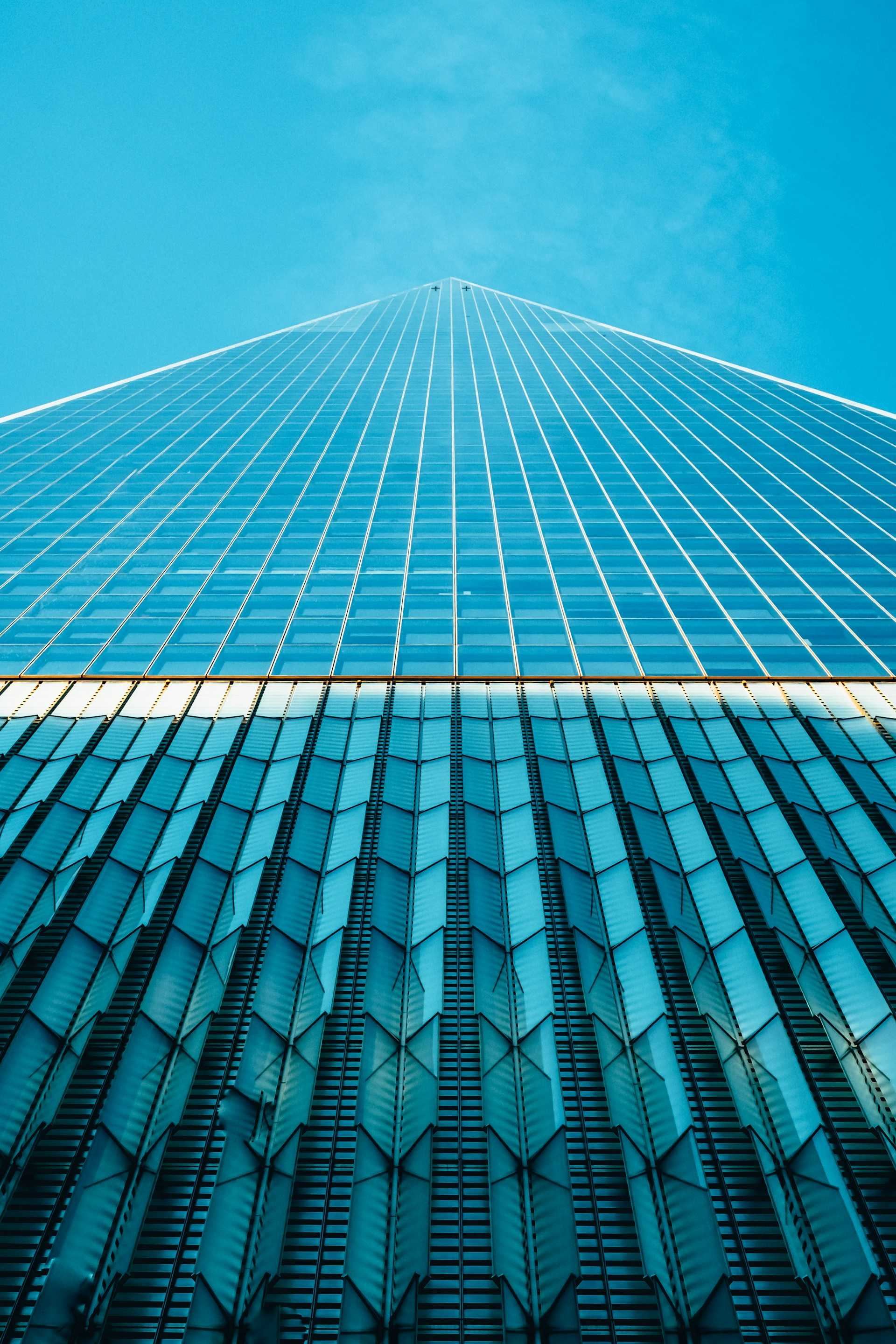 Worm's eye view of glass buildings