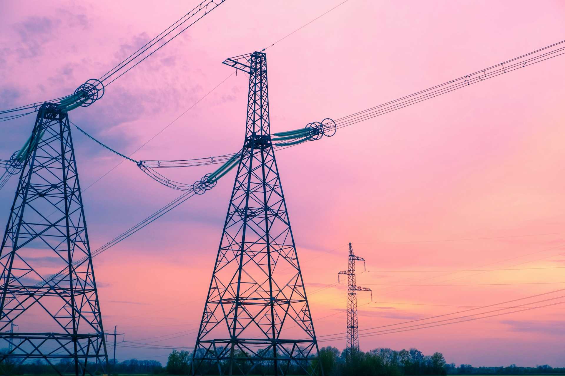 Grid of high voltage tower with sky background. 